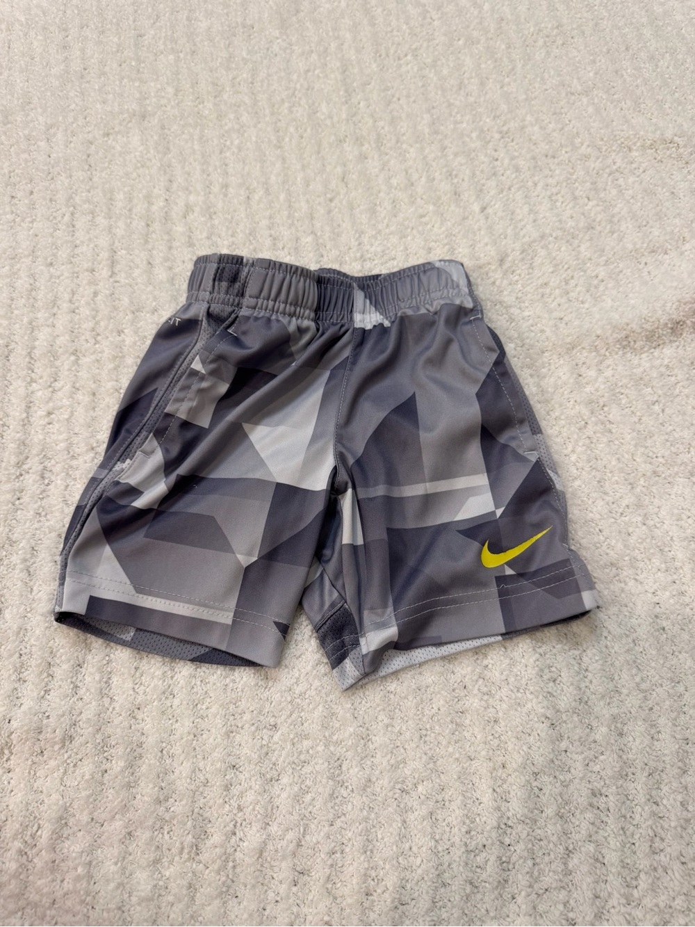 Nike Gray Geometric Print Kids Athletic Shorts with Yellow Swoosh